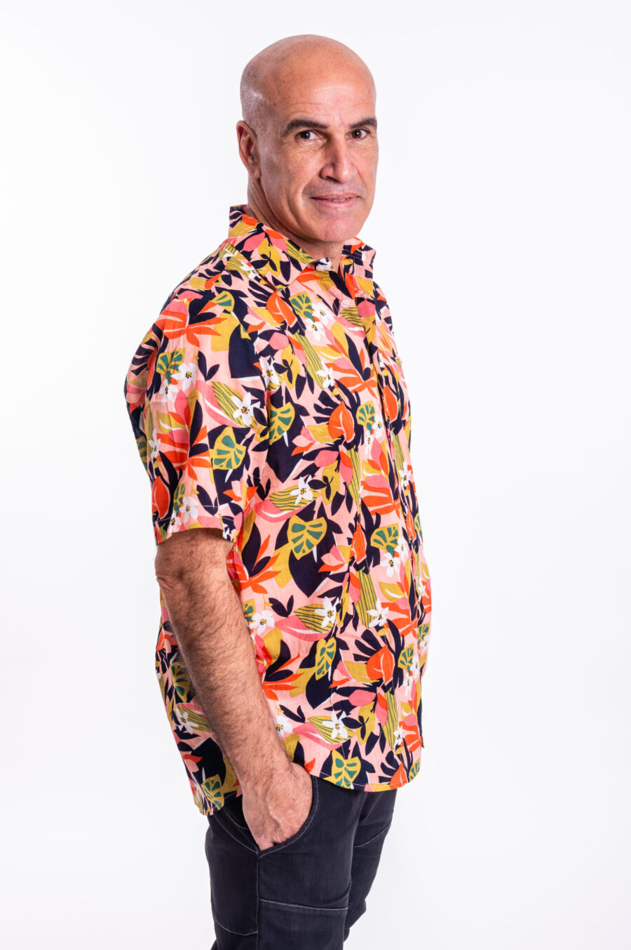 Unisex buttoned shirt for men and women | A light orange-pink buttoned shirt with tropical print - a unique design