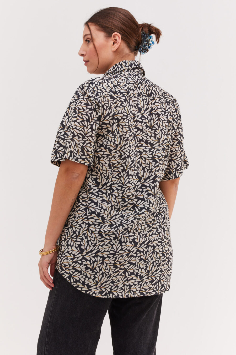 Unisex buttoned shirt for men and women | Olive leaves print on black charcoal background.