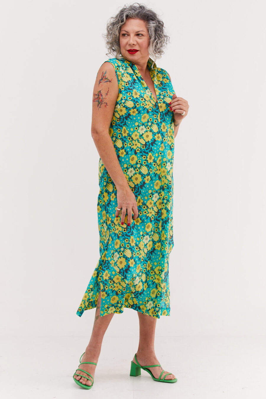Ossi Dress | Uniquely designed dress – Optimism print, tourquise dress with yellow flowers print by comfort zone boutique.