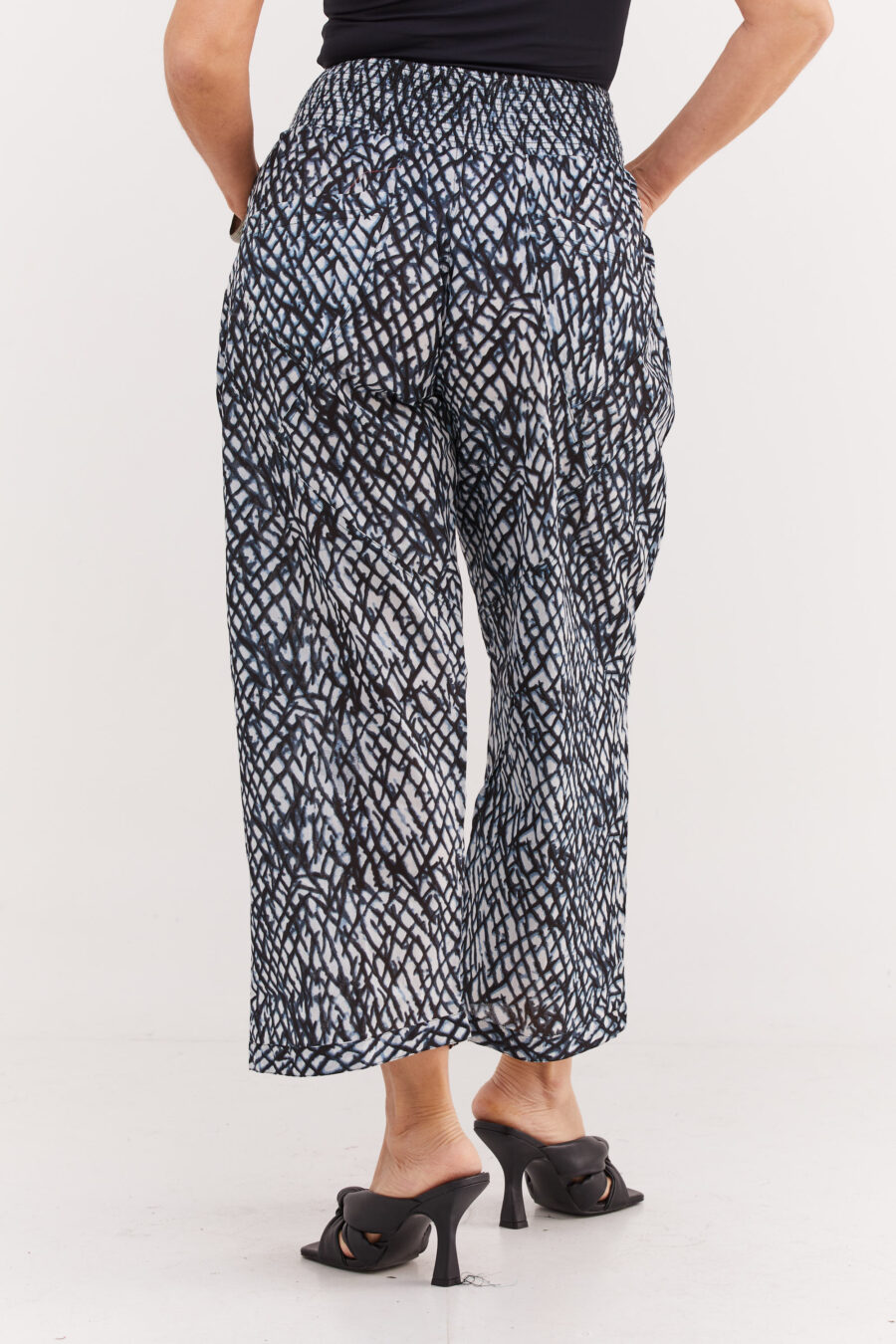 Harmony pants | Flattering and comfortable pants – Black crush print, white pants with black and light blue mesh print by Comfort Zone Boutique