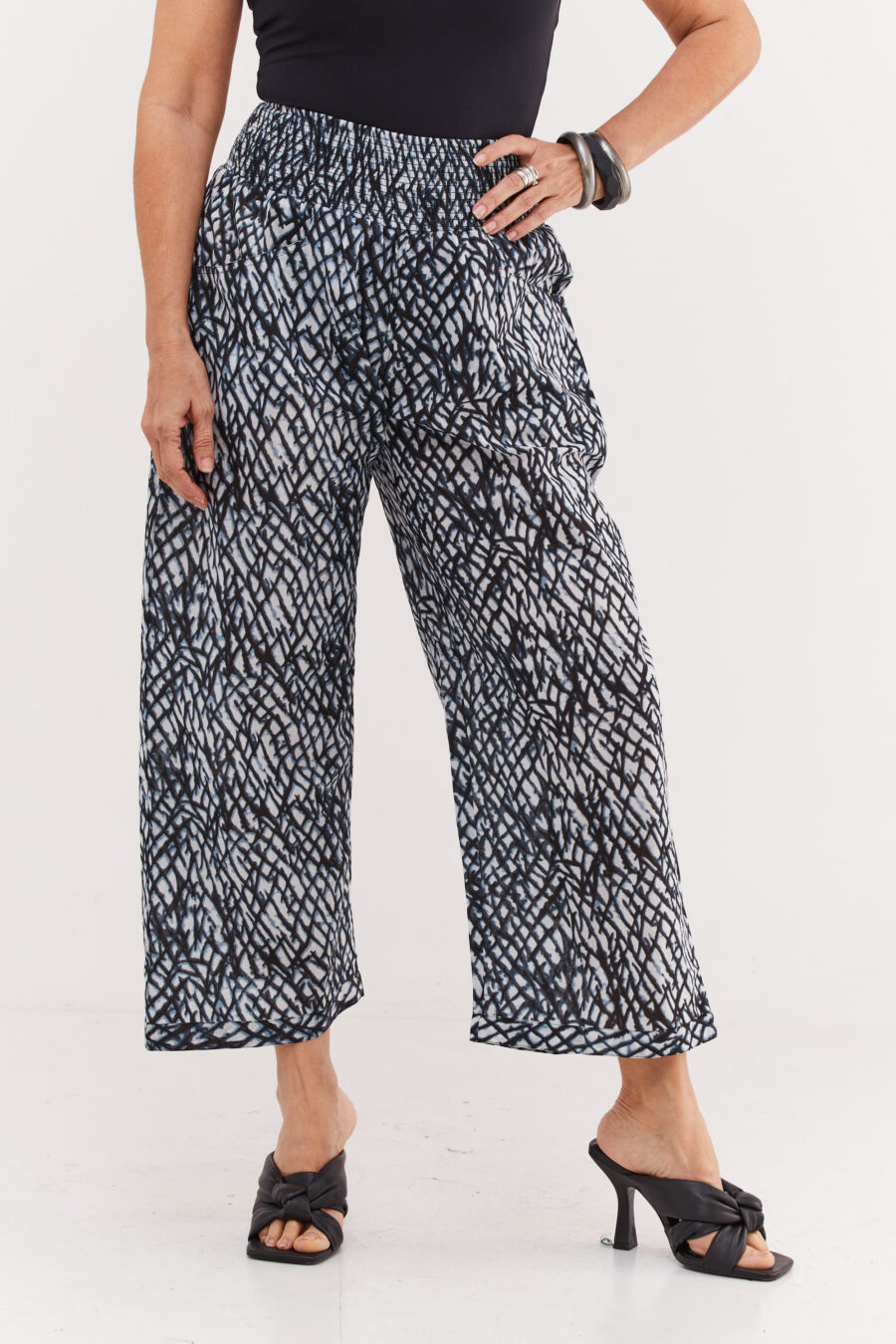 Harmony pants | Flattering and comfortable pants – Black crush print, white pants with black and light blue mesh print by Comfort Zone Boutique