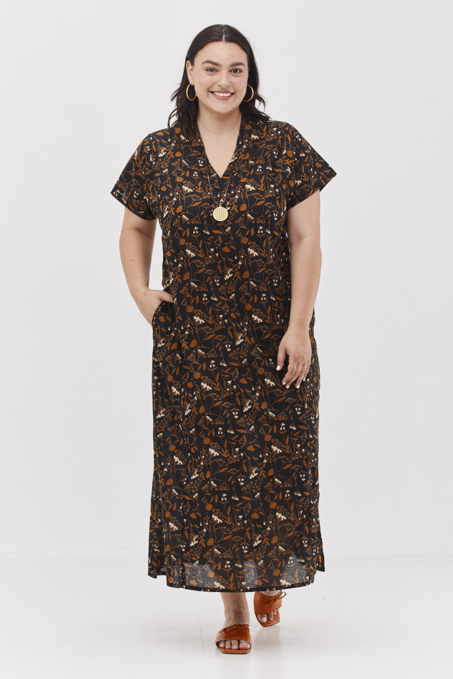 Jalabiya dress | Uniquely designed dress – Waltz print, black dress with light brown leafs and white flowers print.